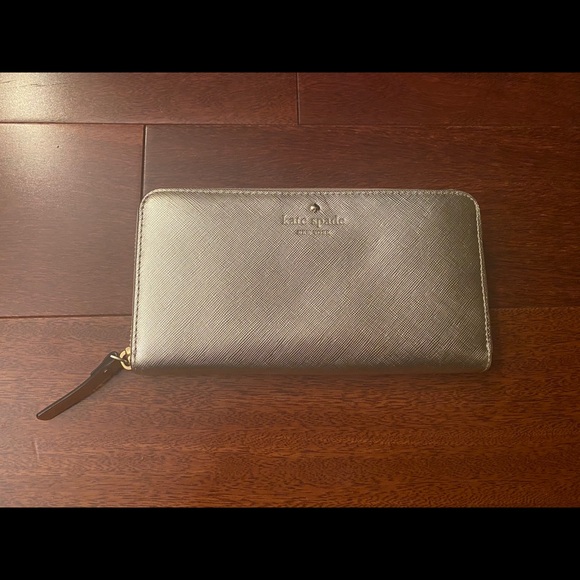 kate spade Handbags - Kate Spade Zip Around Gold Wallet